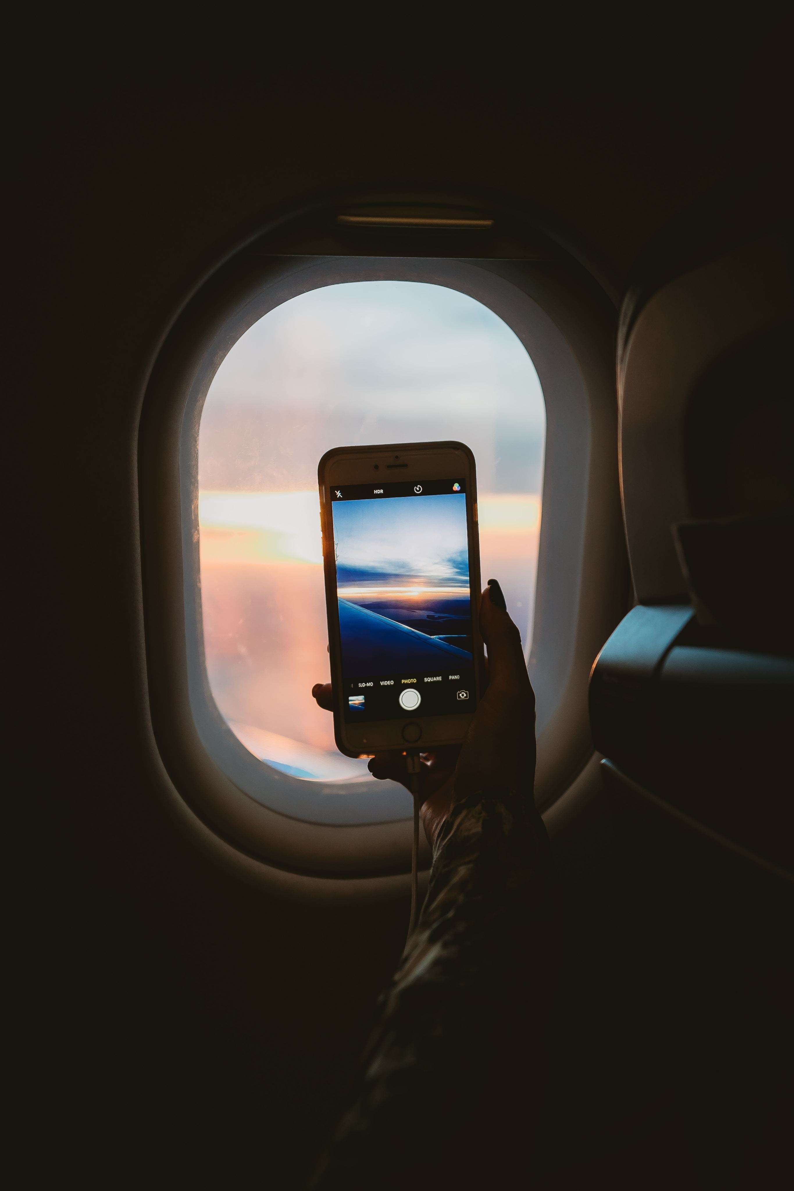 taking-a-picture-through-plane-window